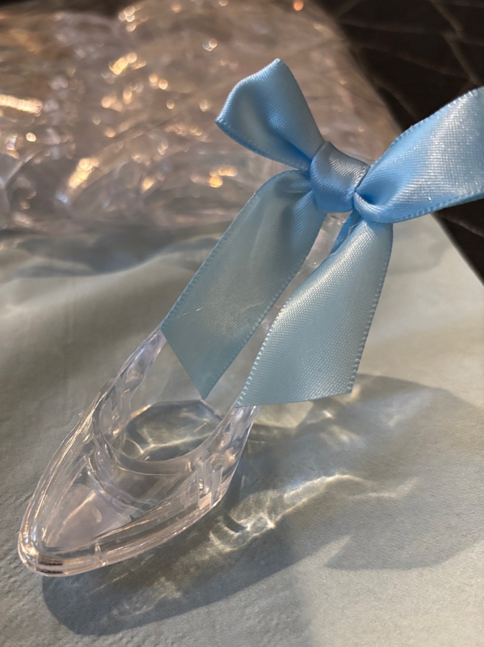 12 Clear Acrylic Cinderella Shoe with 16 Light Blue Satin Bows